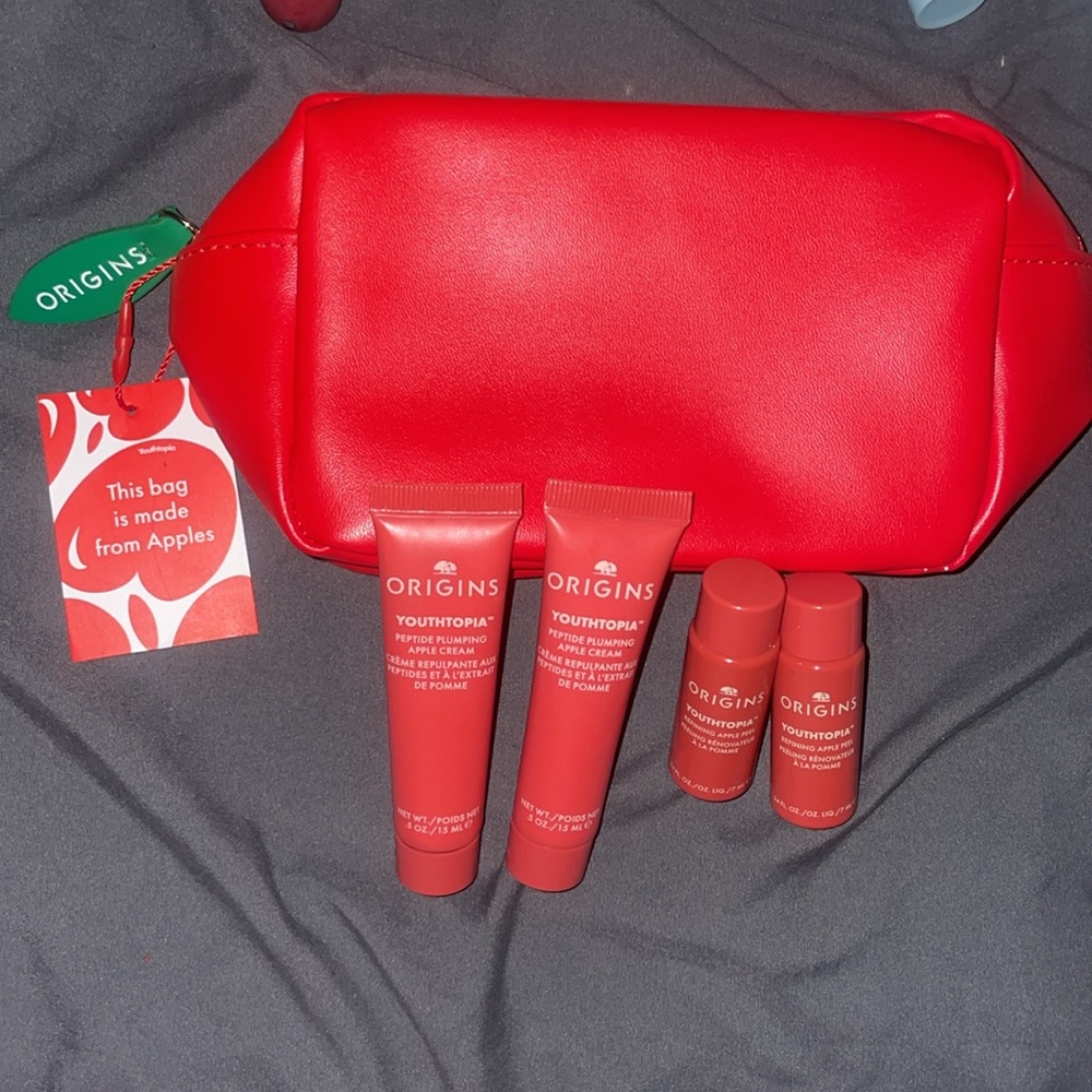 ORIGINS YOUTHTOPIAT™ Duo:Liquid Exfoliating Apple Face Peel + peptide pumping